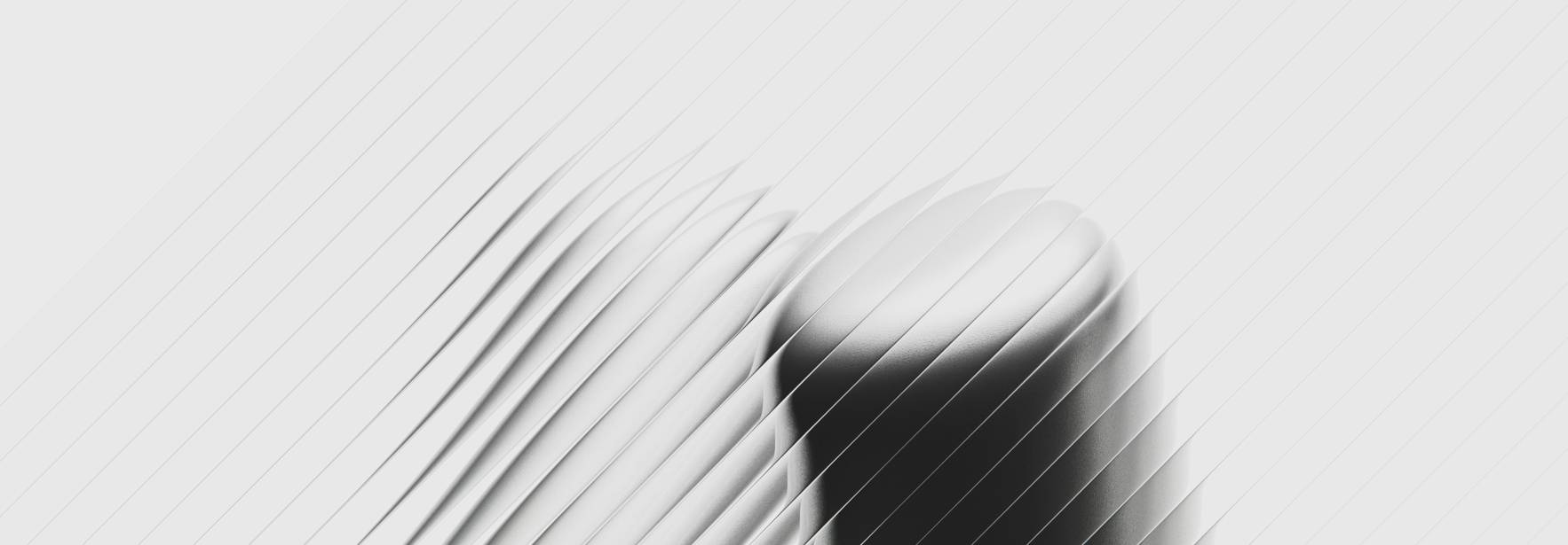 La imagen muestra un objeto oscuro en un fondo claro con un efecto de difuminado lineal.