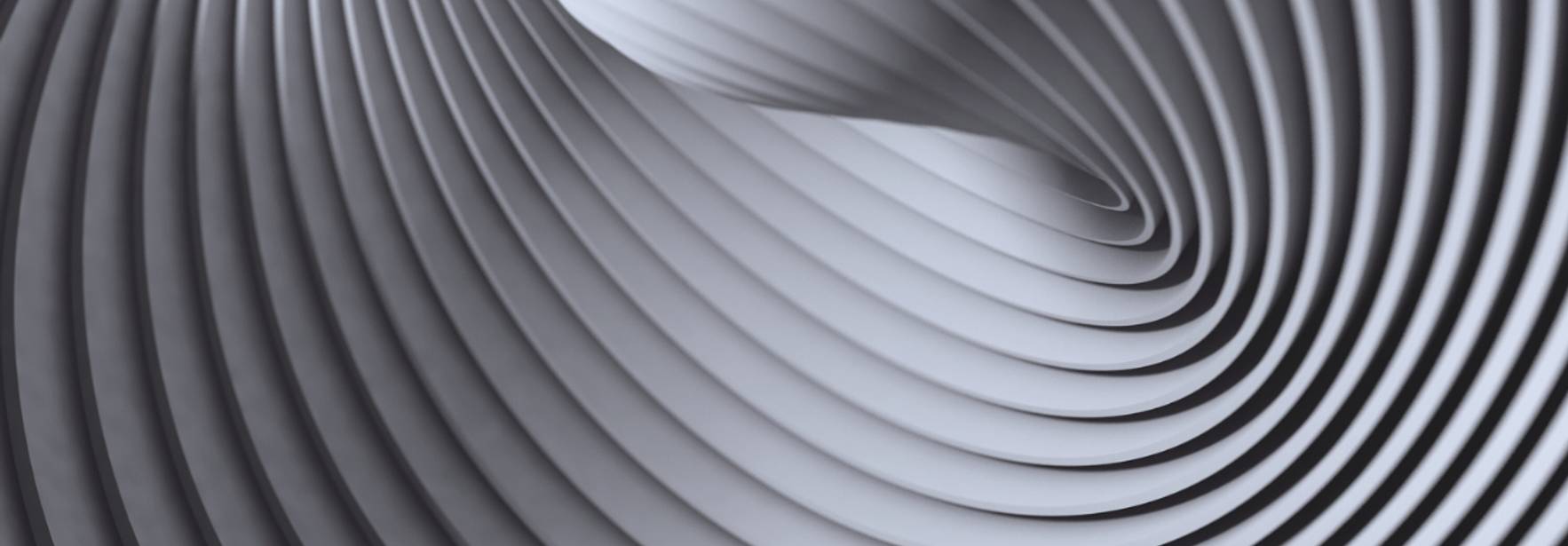 Una serie de ondas en tonos grises que crean un efecto tridimensional.