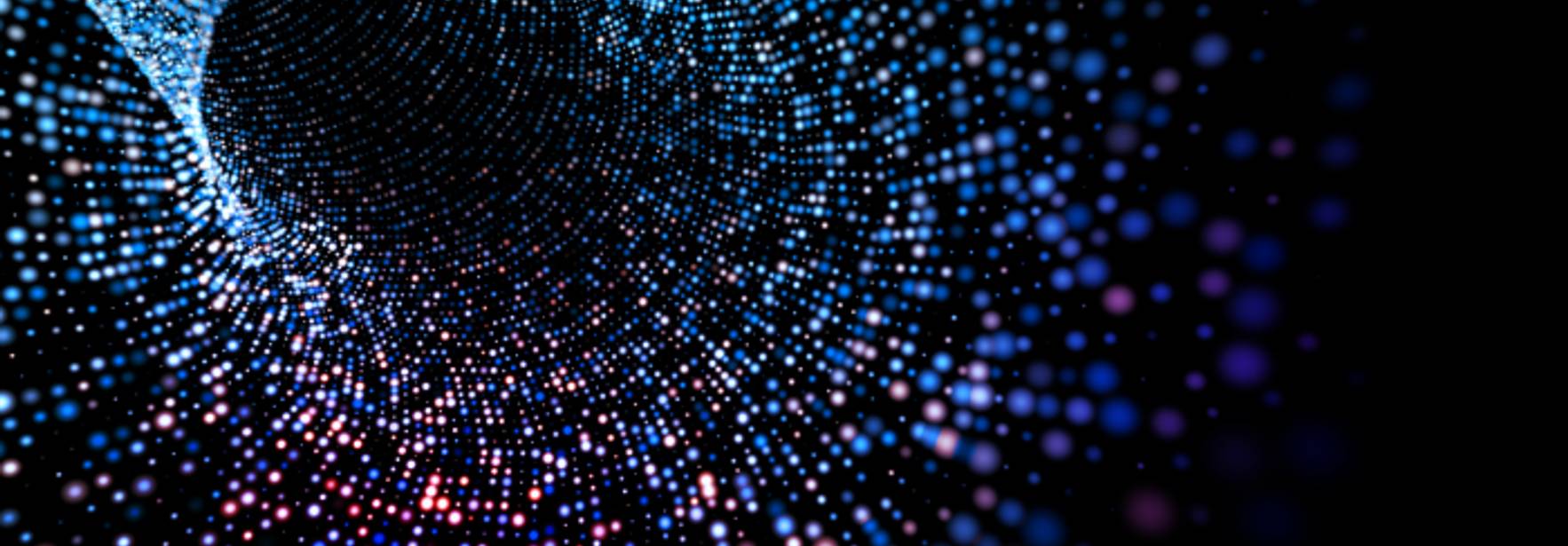 Una representación abstracta de un túnel de puntos brillantes en colores azules y morados.