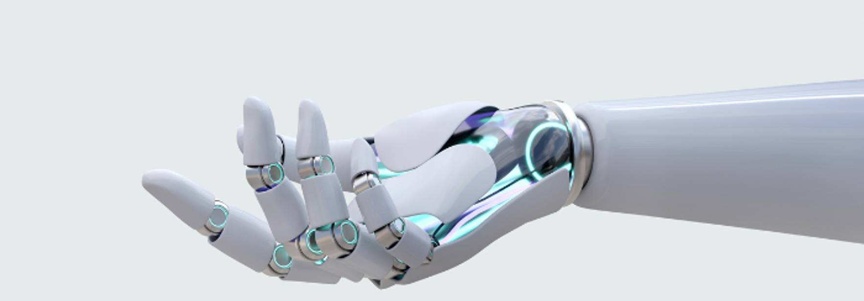 La imagen muestra una mano robótica de diseño futurista con detalles metálicos y articulaciones visibles.
