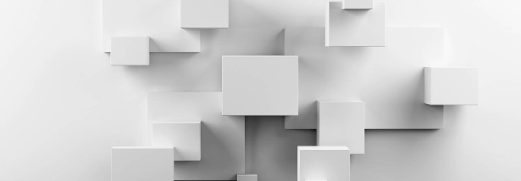 La imagen muestra diversas formas cúbicas blancas dispuestas sobre un fondo blanco.