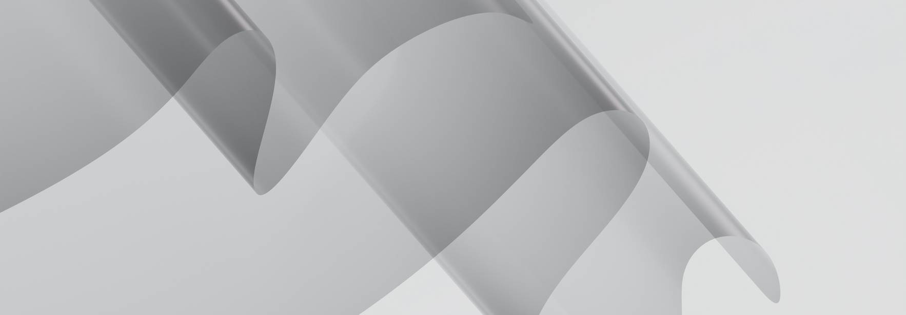 La imagen muestra una serie de ondas suaves y translúcidas sobre un fondo claro.