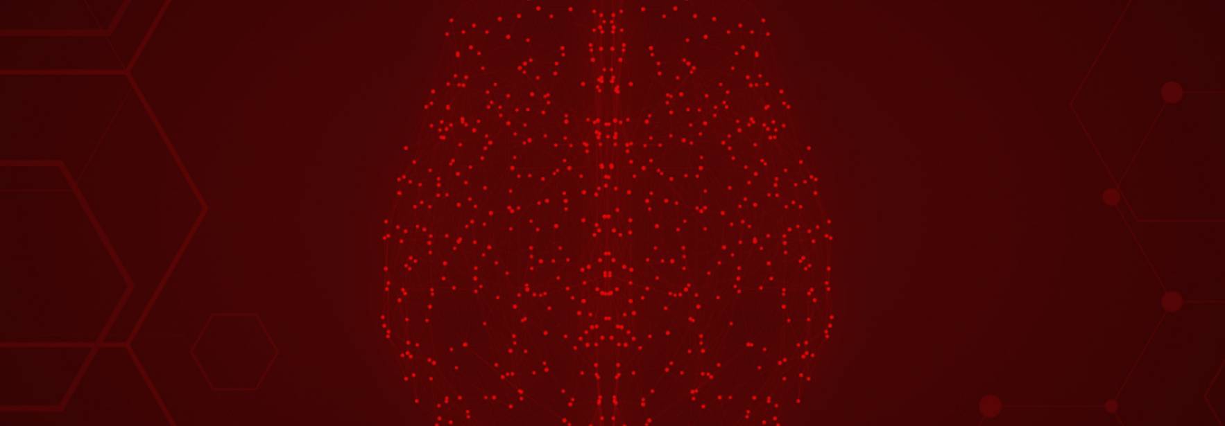 Una representación visual estilizada de un cerebro en color rojo brillante sobre un fondo oscuro con patrones hexagonales.