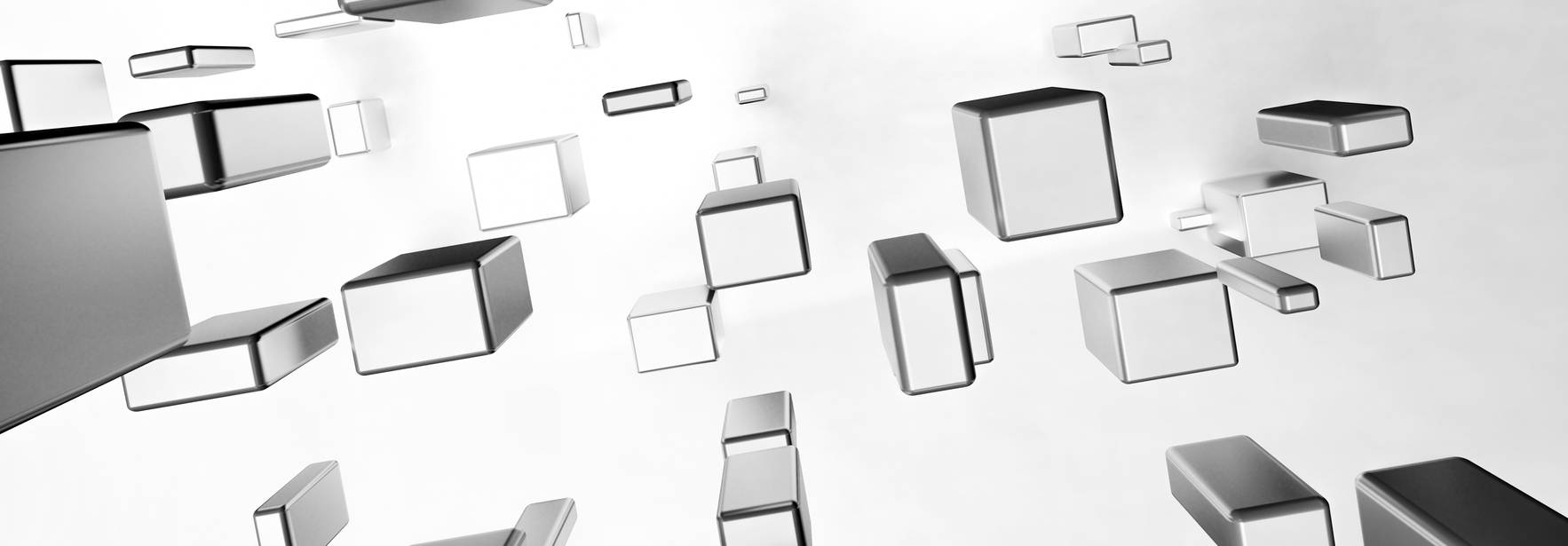 Una serie de bloques tridimensionales flotan en un fondo claro y difuso.