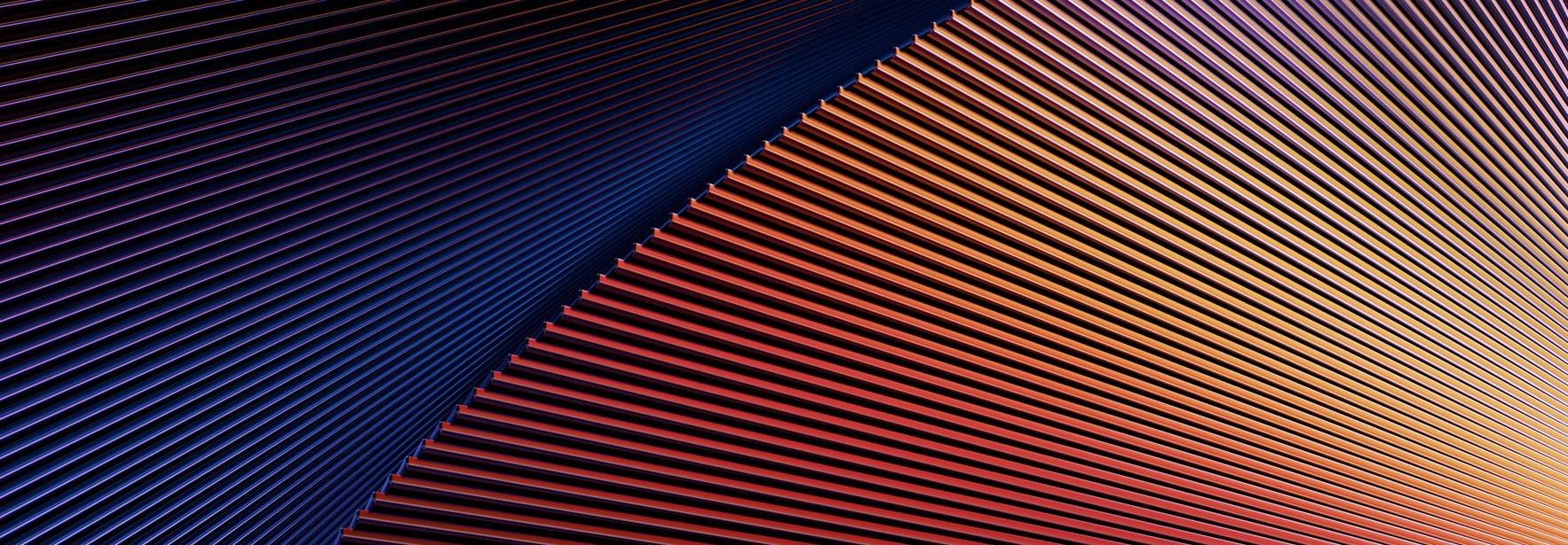 Una imagen abstracta que muestra líneas onduladas en tonos de azul, púrpura y rojo.
