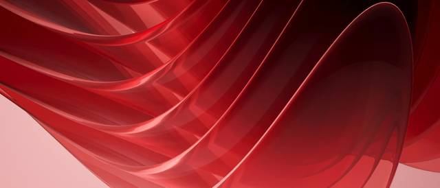 La imagen muestra una serie de ondas rojas translúcidas que se entrelazan en un fondo suave.