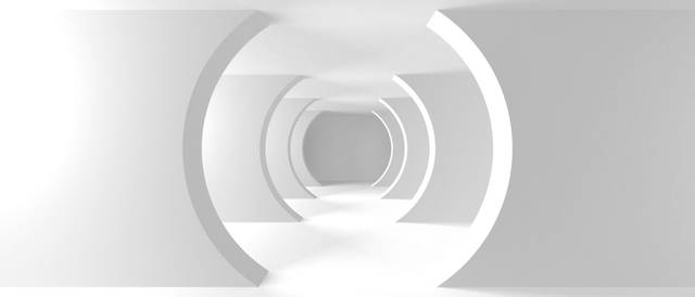 Un pasillo futurista y minimalista de color blanco.