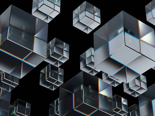 Una serie de cubos transparentes flotando en un fondo negro.