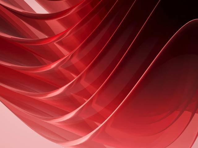 La imagen muestra una serie de ondas rojas translúcidas que se entrelazan en un fondo suave.