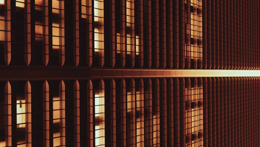 La imagen muestra un patrón arquitectónico con luces brillantes y sombras que crean un efecto visual interesante.