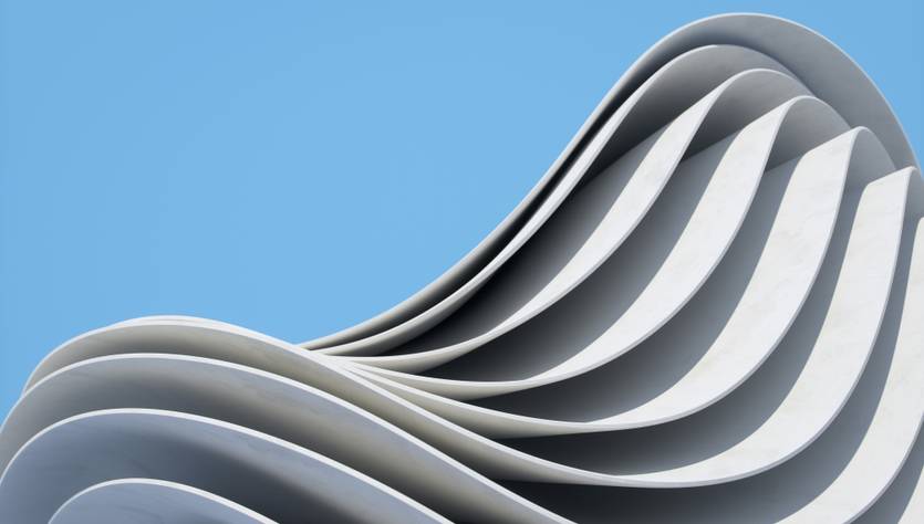 La imagen muestra una estructura arquitectónica con formas onduladas y suaves en un fondo azul claro.