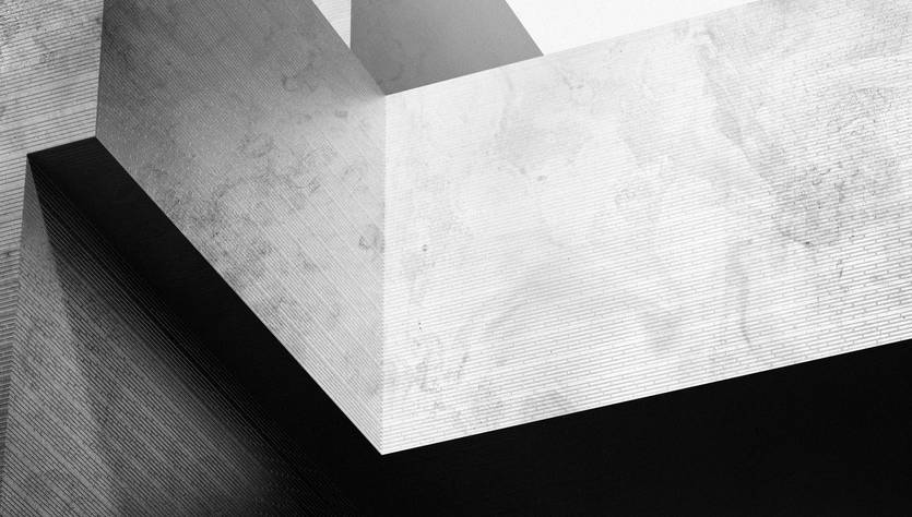 Una composición abstracta en blanco y negro de estructuras geométricas superpuestas.