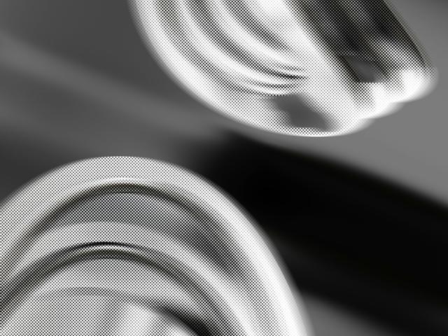 La imagen presenta dos formas abstractas en blanco y negro con un diseño ondulado.